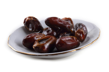 Date fruits isolated on white