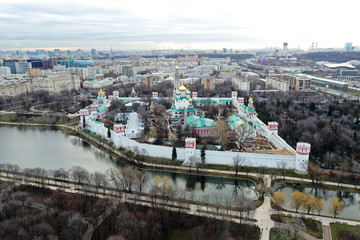 Fototapeta premium panoramic views of the lake, the fortress and the Christian temple of the big metropolis taken from the drone