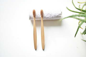 Bamboo brushes on a white background. eco- friendly product for health. Zero waste.