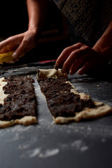 baker prepares homemade cakes
