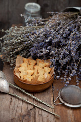 Homemade cookies in the shape of bears. Baking on the kitchen table. Flour product. Still life, close-up. Teddy bear cookies.