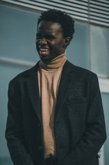 portrait of a black man laughing 