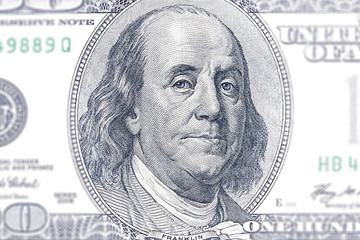 Close up portrait of American President Benjamin Franklin on a 100 dollar bill.