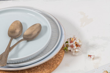 Empty plate onwhite table. Food background for menu, recipe. Table setting. Flatlay, top view. Mockup for restaurant dish