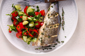 Baked thyme fish and salad
