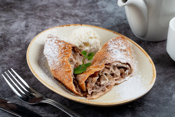 Classic apple strudel with raisin and cinnamon