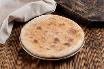 Simple wheat italian focaccia without any topping or seasoning