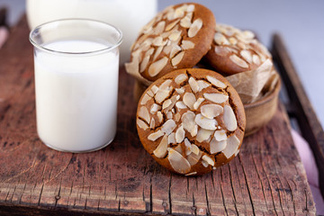 Sweet almond cookies  on wooden table.French homemade cookie. Useful Lenten cookies from almond flour with honey on rustic wooden background. Selective soft focus.