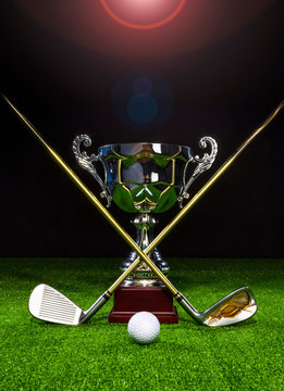 Golf club with golf ball and a golf trophy on the turf
