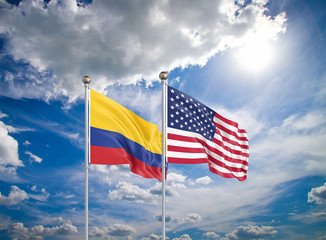 United States of America vs Colombia. Thick colored silky flags of America and Colombia. 3D illustration on sky background. - Illustration