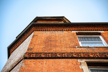 Close-up of a typical british residential brick house facade.