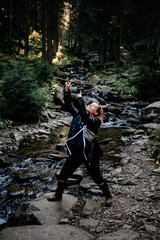 Obraz premium female hiker in the forest