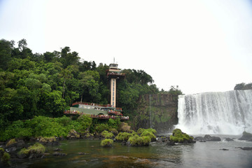 raging waterfall and mountain river in the jungle