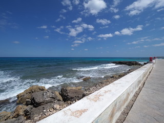 Fototapeta na wymiar Shore and promenade on Isla Mujeres near Cancun city in Mexico
