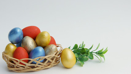 colorful easter eggs in a basket