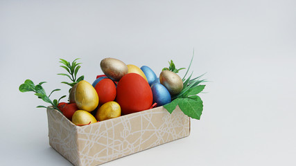 bright colored Easter eggs are in a box