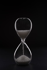 hourglass on a black background