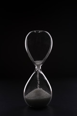 hourglass on a black background