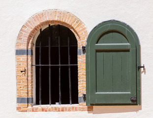 old window in brick wall