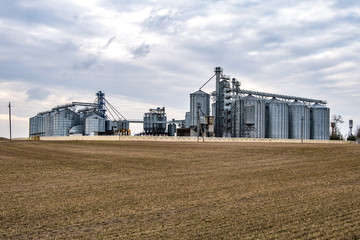 agro-processing and manufacturing plant for processing and silver silos for drying cleaning and storage of agricultural products, flour, cereals and grain. Granary elevator.