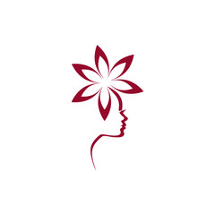 Female profile face with a beautiful flower icon
