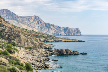 The city of Palaiochora, Paleochora in Crete, Greece, in its beauty with the Crocodile rock behind it