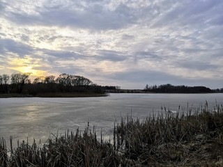 sunset over the winter lake