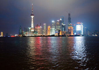 Fototapeta premium Night view on Pudong skyline seen from the Bund, Shanghai in China