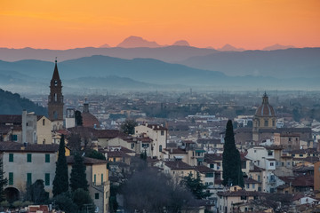 Fototapeta na wymiar A Florentine sunset leaves the Tuscan hills orange