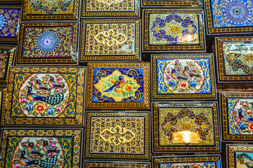 Decorated wooden boxes for sale on the Grand Bazaar also called Qeysarriyeh or Soltani bazaar in Isfahan city, Iran