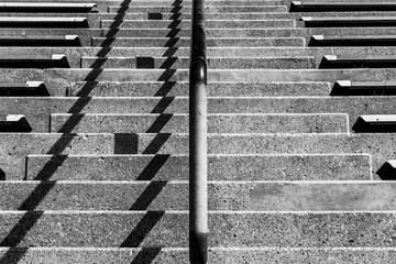 Treppenaufgang mit Eisenstange