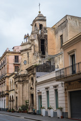 Fototapeta na wymiar Row of buildings with San Rocco church in Acireale city on Sicily Island, Italy