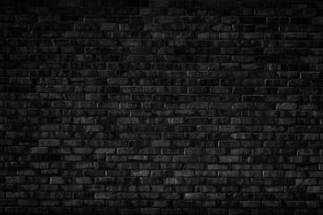 Fototapeta na wymiar Old black and white brick wall background texture.