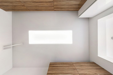 suspended ceiling with led lightspot lamps and drywall construction in empty room in apartment or...