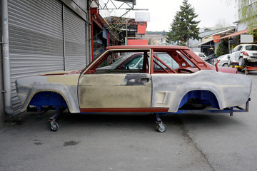 Classic italian rally car in a repair shop