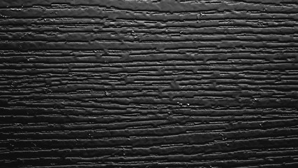 Background of black plaster with irregularities