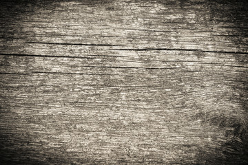 Background of an old gray wooden Board with cracks, closeup