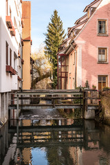 Little bridge between houses of the old section of the town