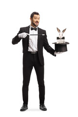 Magician performing a trick with a hat and a rabbit