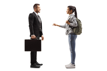 Female student talking to a businessman with a briefcase