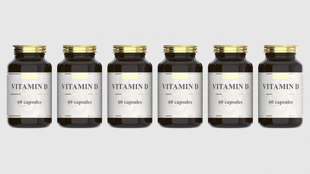 Pharmacy glass bottles with generic vitamin D capsules and fictional logo. Pharmaceutical industrial production related 3D animation