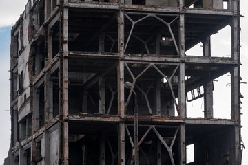 Frame of an old destroyed industrial building.