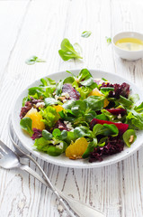 Fresh beetroot, orange, soft cheese  and greens salad
