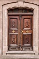 Old wooden door of an old historical building