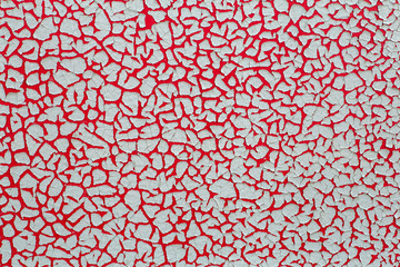 Old paint background. Texture and pattern of peeling dried old paint on the wall. Old painted wall background