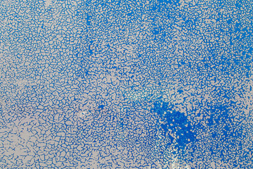 Old paint background. Texture and pattern of peeling dried old paint on the wall. Old painted wall...