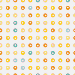Colorful little doughnuts polka dots seamless vector pattern on a white background. Delicious snack surface print design.Great for fabrics, wrapping paper, menus, gift wrap, packaging, and cards.