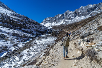 Fototapeta premium The hiker and mountain beautiful scenary toward the summit