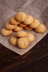 Lean cookies with coconut on a brown background