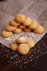 Lean cookies with coconut on a brown background